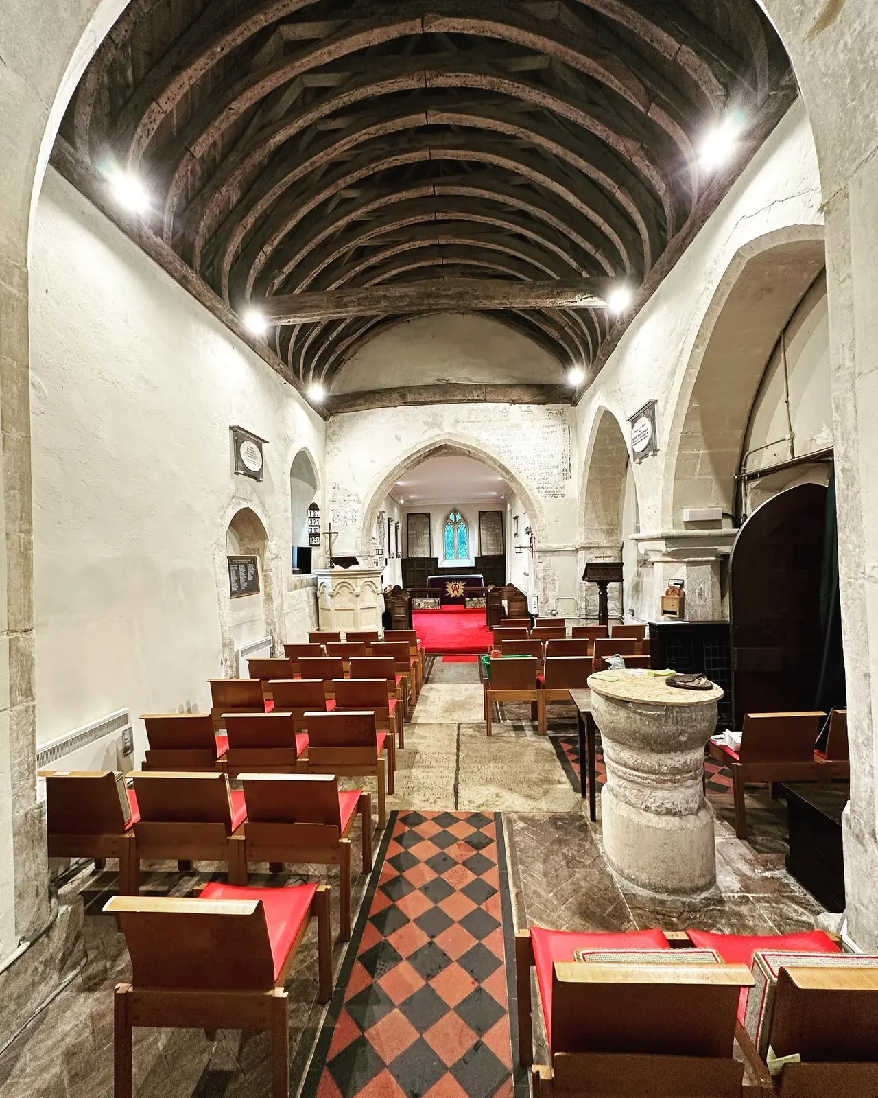 New lighting illuminating the timber roof of a historic church