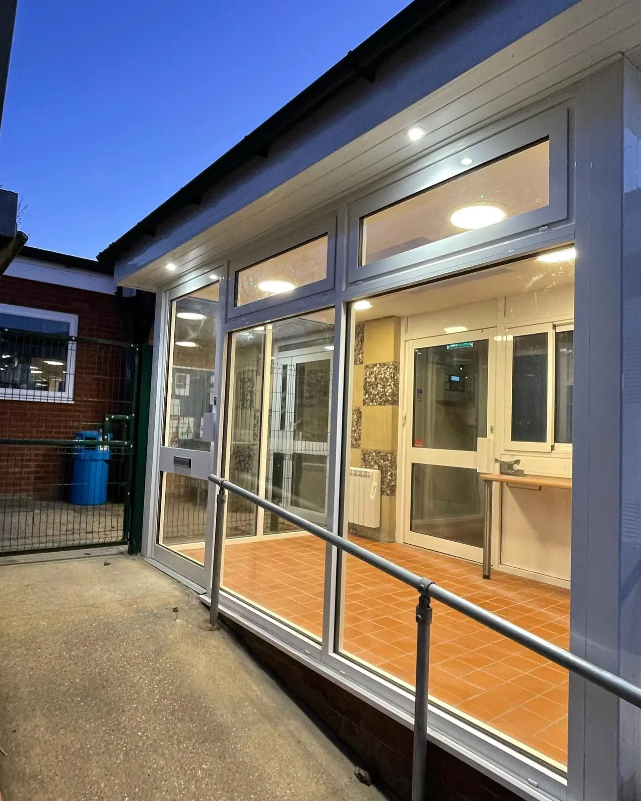 New external and internal lighting at a commercial entrance